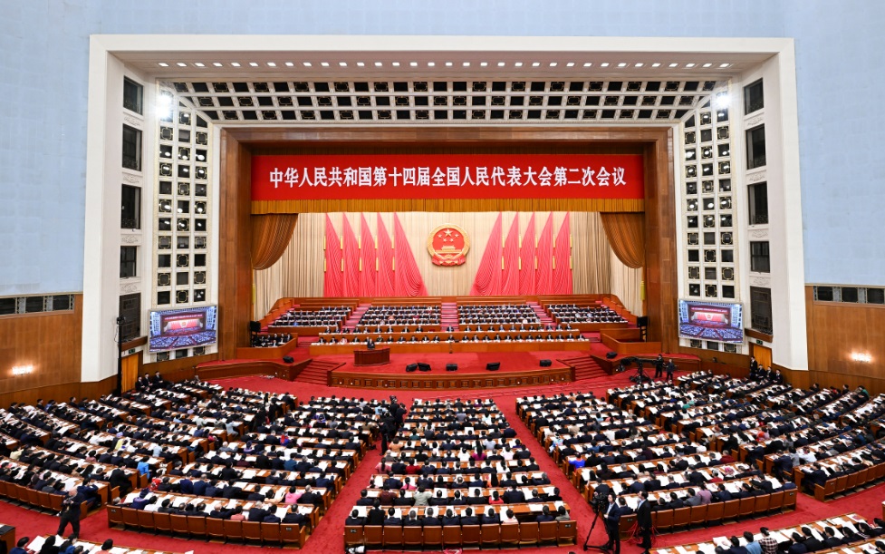 3月8日，十四屆全國人大二次會議在北京人民大會堂舉行第二次全體會議。 新華社記者 張領 攝