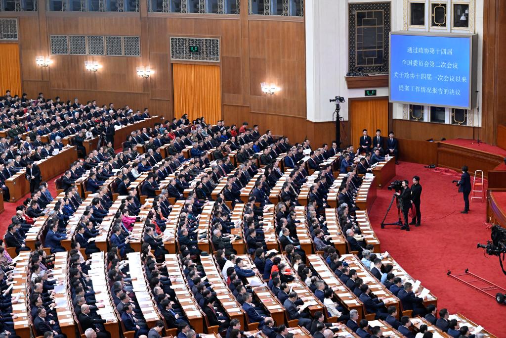 3月10日，中國人民政治協商會議第十四屆全國委員會第二次會議在北京人民大會堂舉行閉幕會。新華社記者 申宏 攝